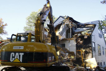Demolition of the former home at 708 11th St. NW. Photo by Steve Silseth