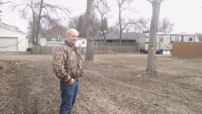 Steve Silseth looking over the lot where his family home formerly stood. Photo by Josh Wolsky
