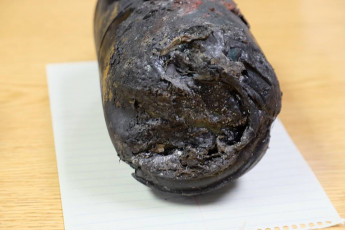 Propane canister recovered at site of Sunday injury.