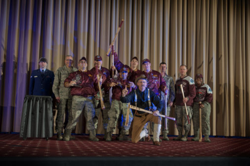 The 91st Missile Wing celebrates after winning best intercontinental ballistic missile electronics laboratory crew, during the Global Strike Challenge score posting event on Barksdale Air Force Base, La., Nov. 5, 2014. The score posting event connects the command's heritage and mission, while at the same time recognizing and celebrating the "best of the best" in technical and weapons system expertise in the bomber, missile and security forces areas. (U.S. Air force photo/Senior Airman Brittany Y. Bateman)