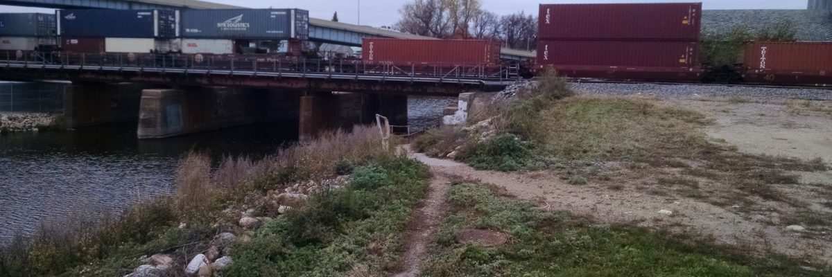 This poorly maintained, but well-worn path between the Roosevelt School and Ben's Tavern neighborhoods will be yet another sacrifice to flood protection. There will be no path or outlet on the North side of the tracks.